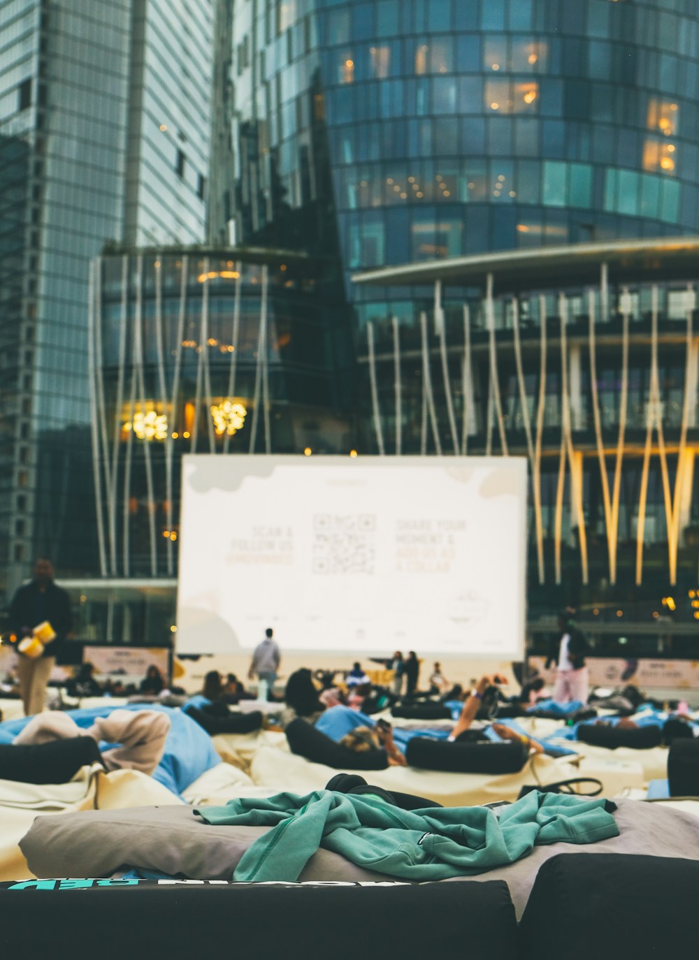 People settling in for an outdoor film screening